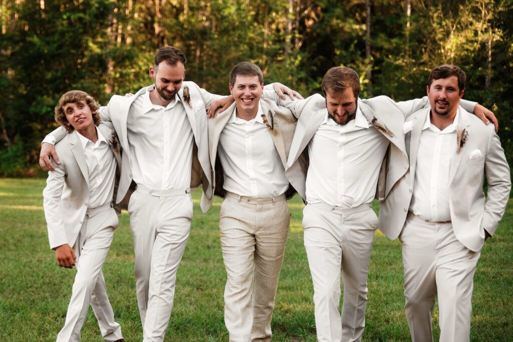 groom and groomsmen at rustic oaks ranch wedding venue nikki rinc photography fall wedding 