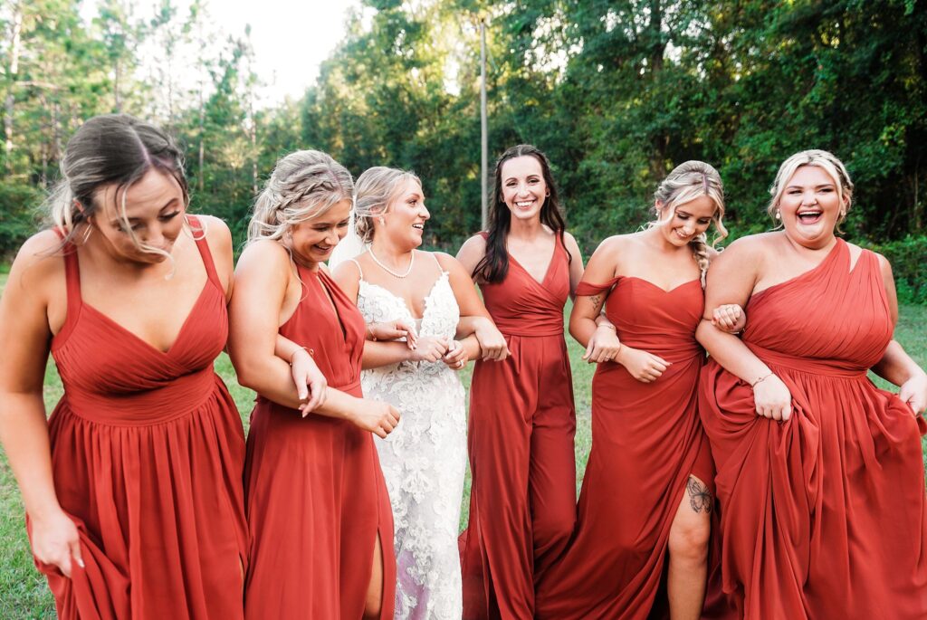 bride and bridesmaids photos at rustic oaks ranch wedding 