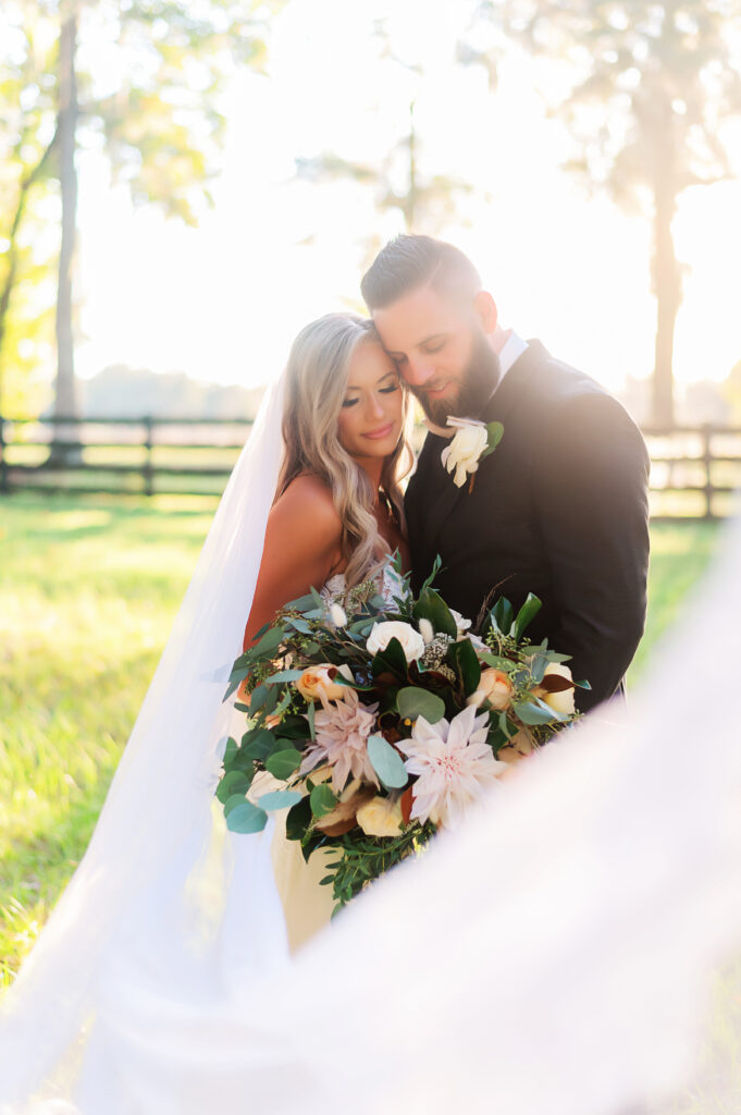 Valley View Wedding bride and groom veil shot