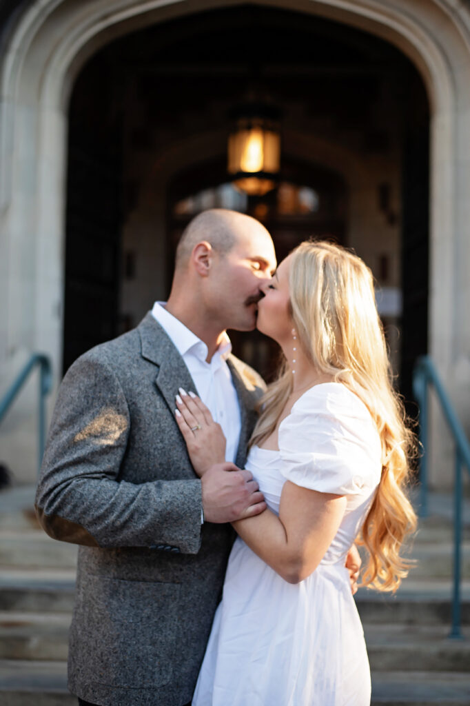 couple kissing at their princeton university engagement session