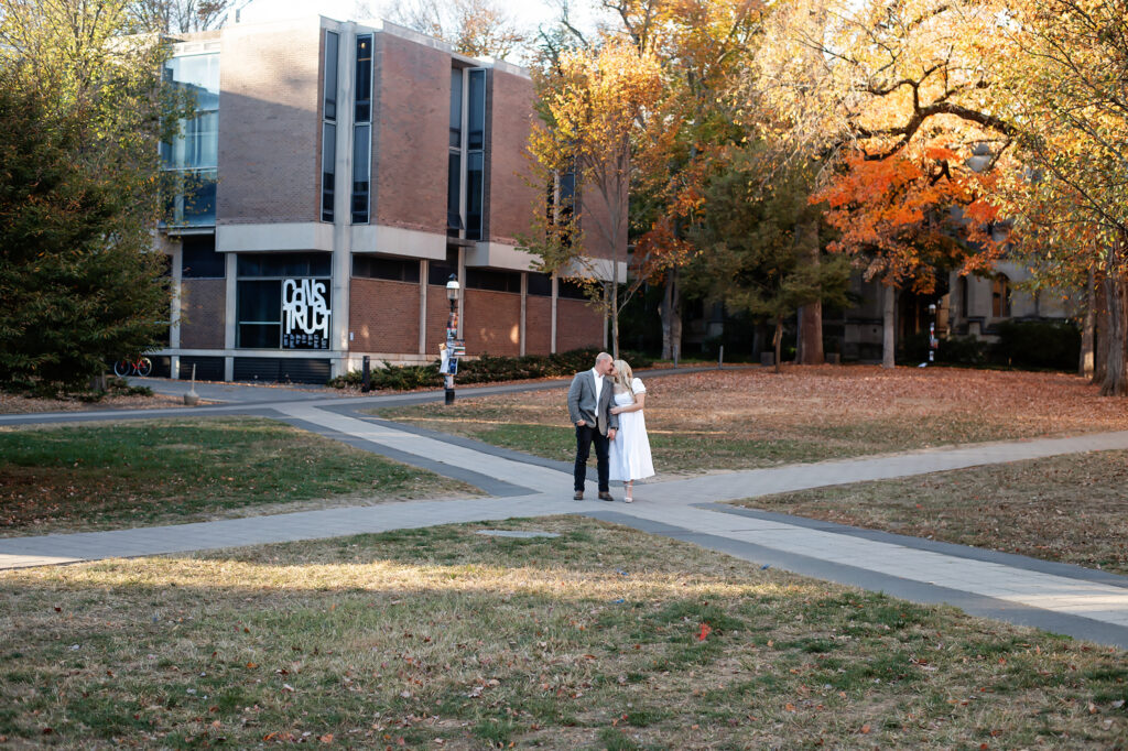 couple standing together at their princeton university engagement session