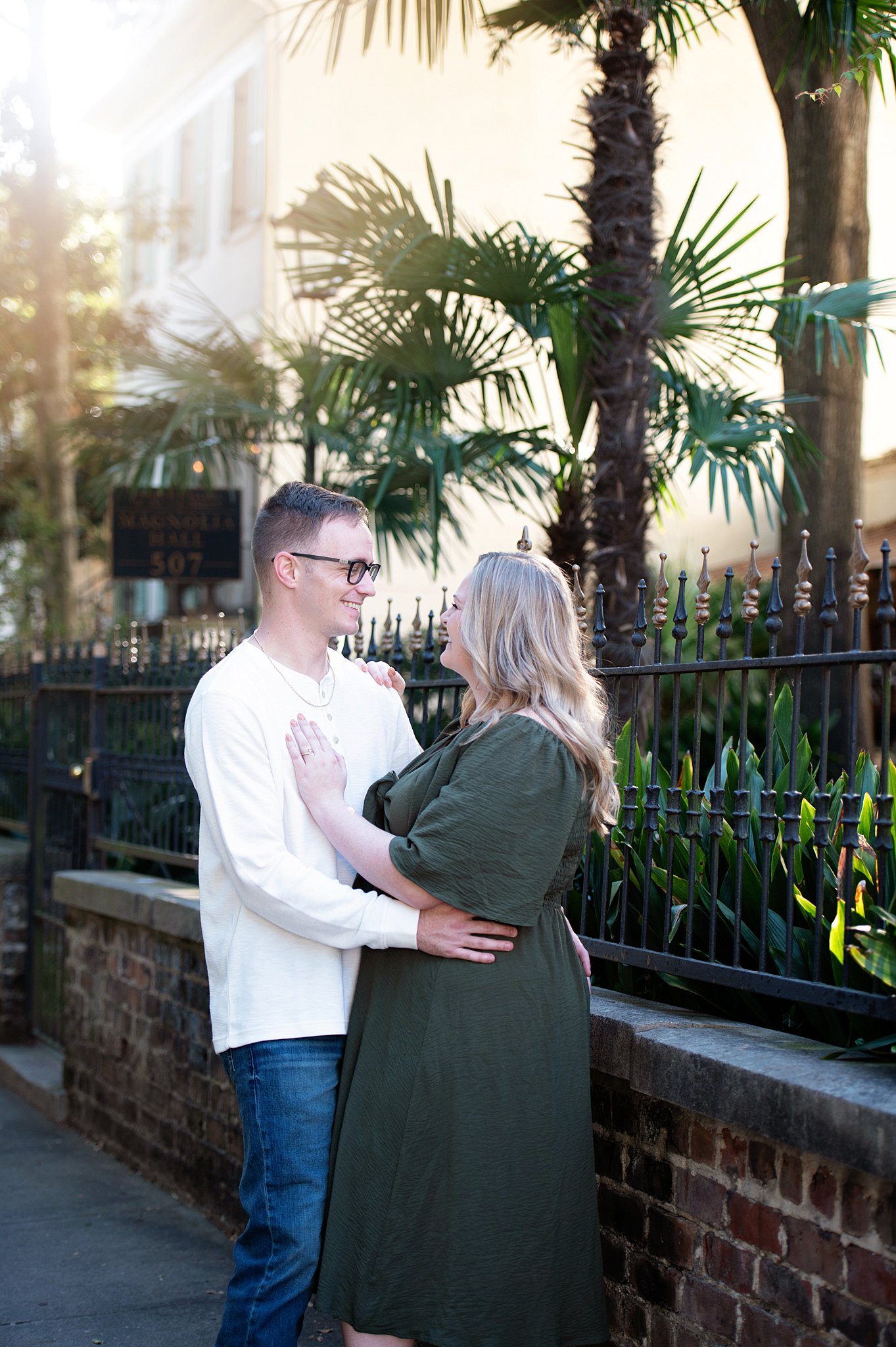 couple facing each other at forsyth park