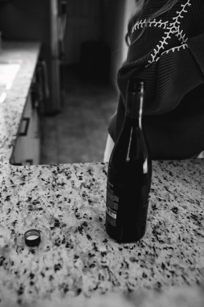 open wine bottle from engagement session