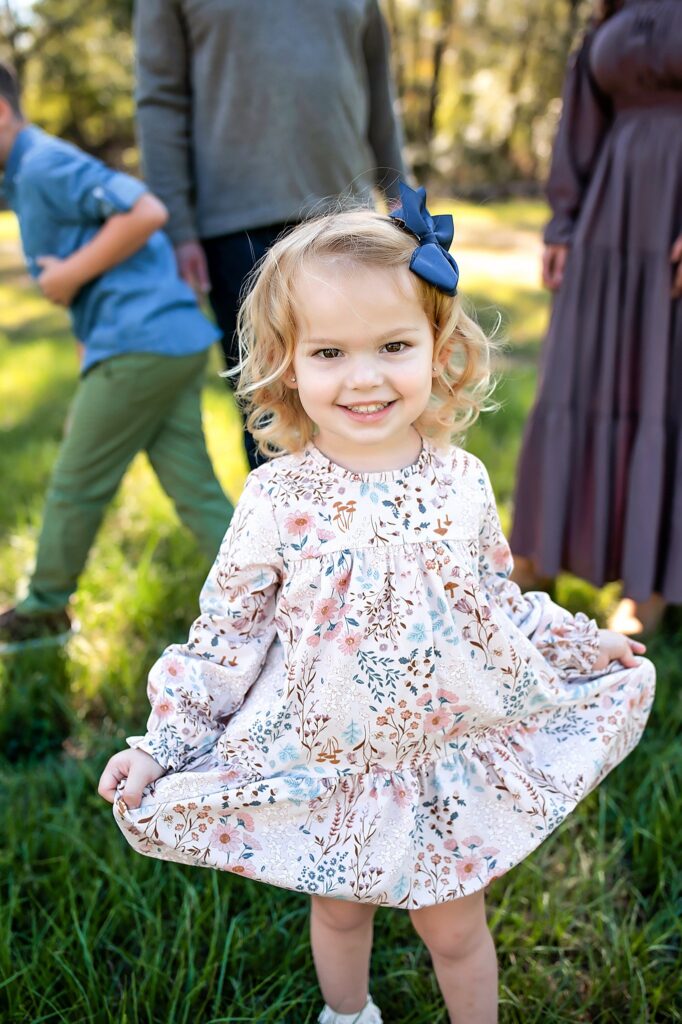 gainesville family photographer little girl posing in a dress