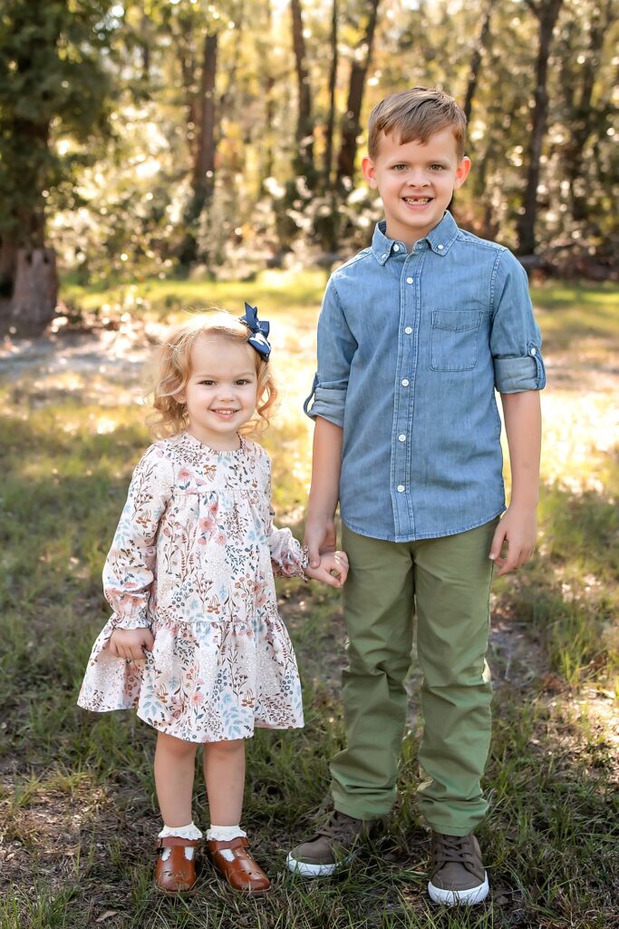 brother and sister golden hour