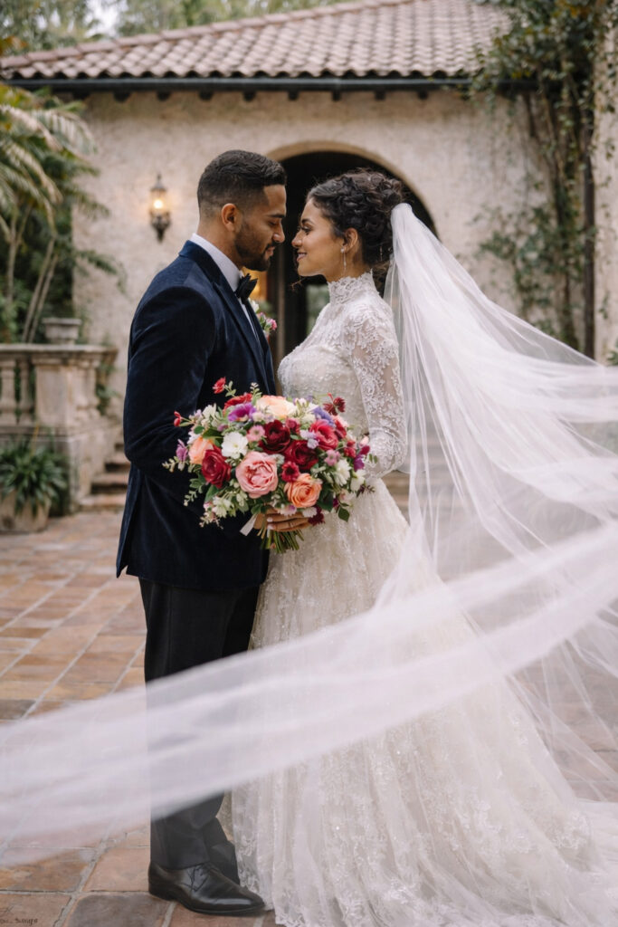 a bride and groom on their wedding day at villa woodbine wedding venue