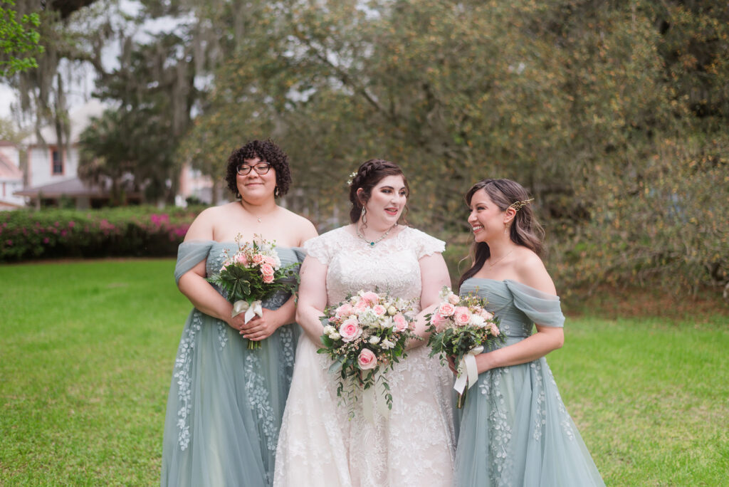 Soft sage bridesmaid dresses at a Thomas Center garden wedding in Gainesville