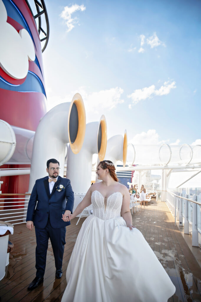 Bride and groom portraits on deck during Disney Wish wedding