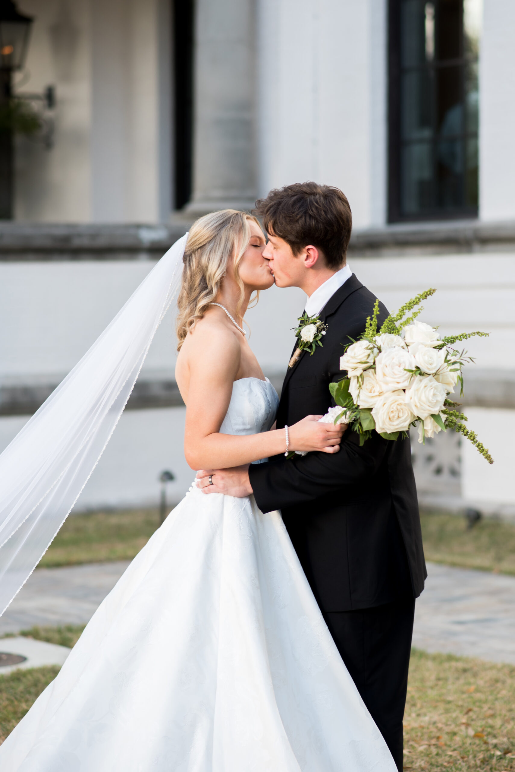 bride + groom kissing on their wedding day at 1908 Grand in Gainesville Florida